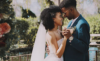bride and groom touch foreheads at Kimpton Hotel Fontenot